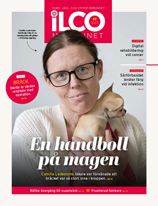 Magasinets framsida, som visar fotoporträtt av Camilla Lamberts mot neutral bakgrund. Hon håller sin hundvalp Chip i famnen.